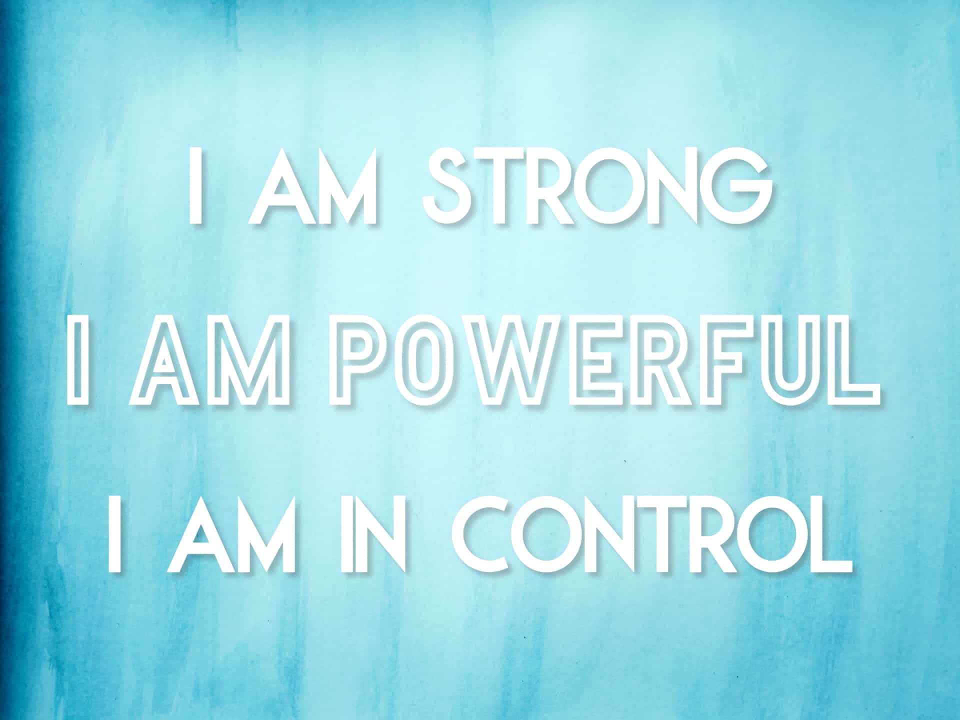 "I am strong, I am powerful, I am in control" mantra on a blue watercolor background