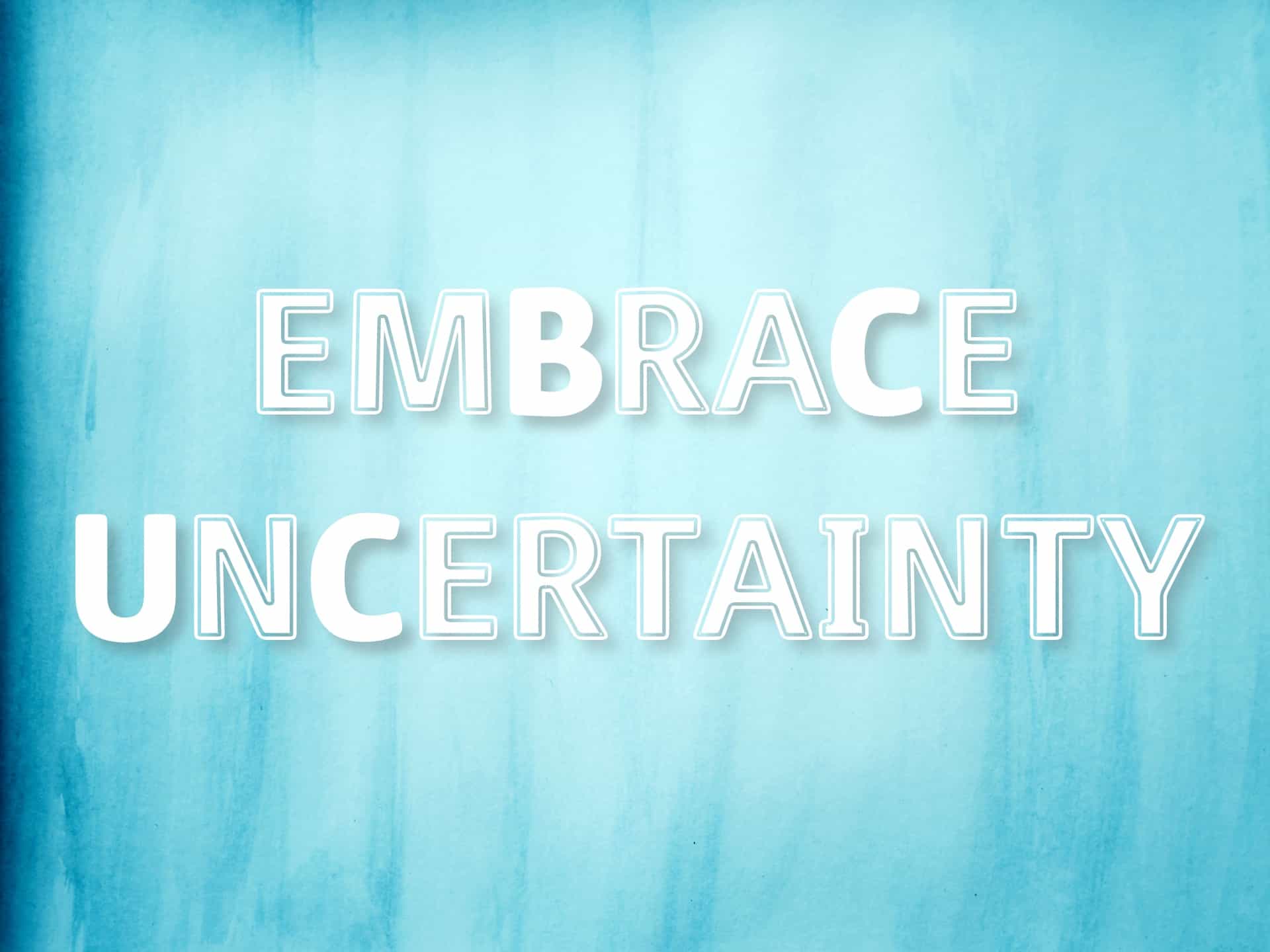 "Embrace Uncertainty" mantra on a blue watercolor background
