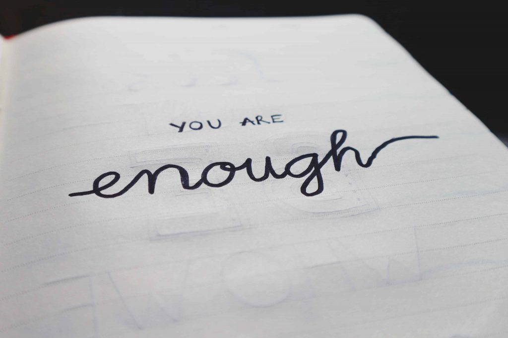 You are Enough quote written on paper