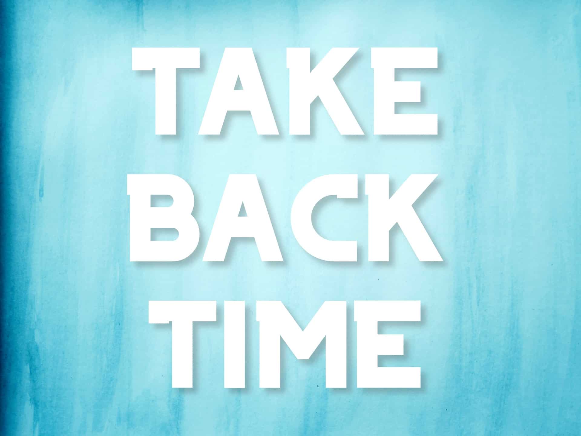 "Take back time" mantra over a blue watercolor background