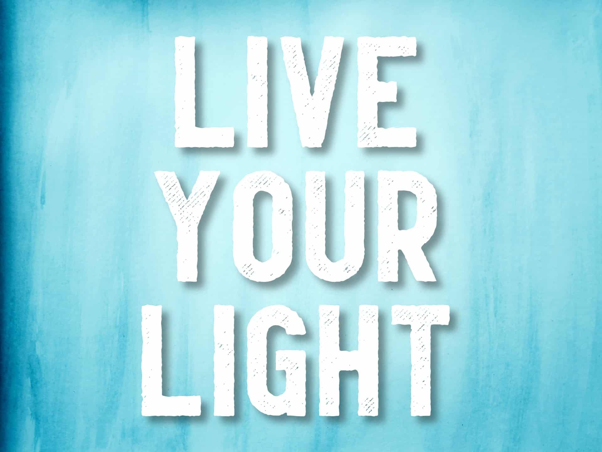 "Live your light" mantra over blue watercolor background