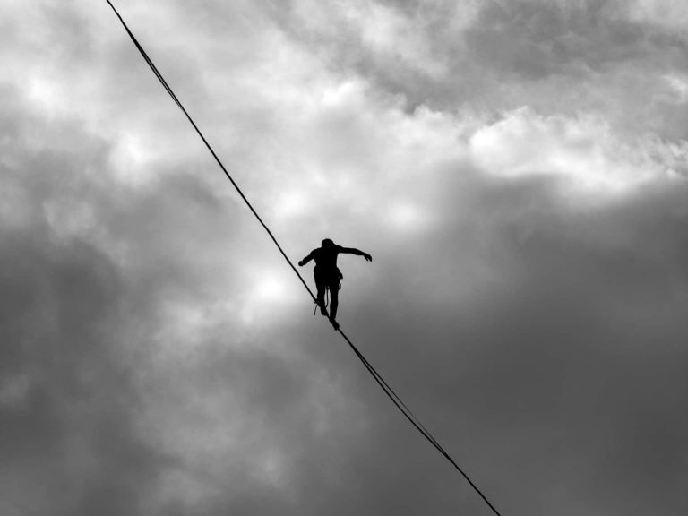A person walking on a tightrope