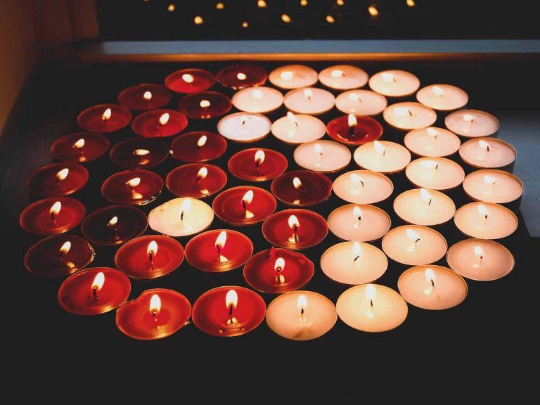Red and white candles shaped in the yin and yang symbol
