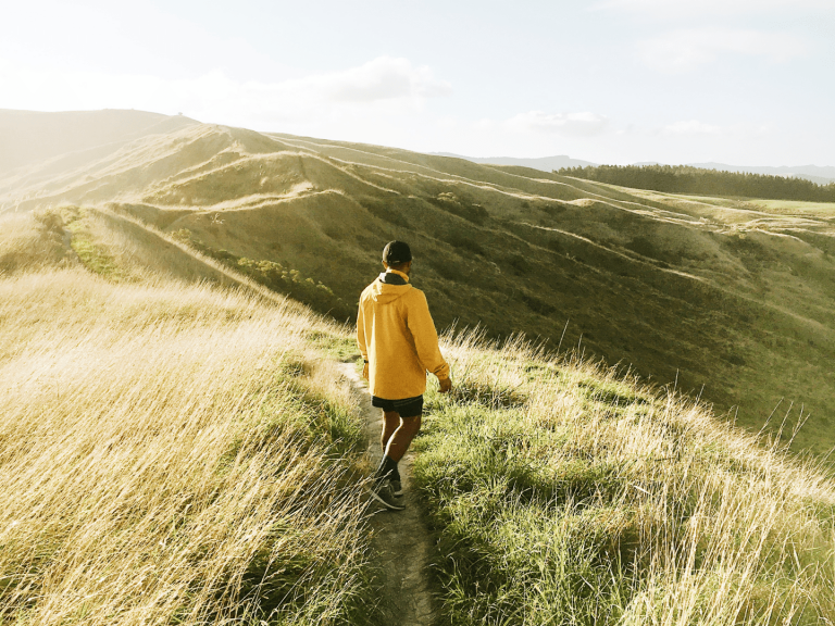 A person walking on their own trail in nature