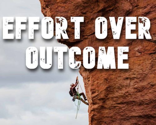 "Effort over outcome" mantra over a picture of a rock climber
